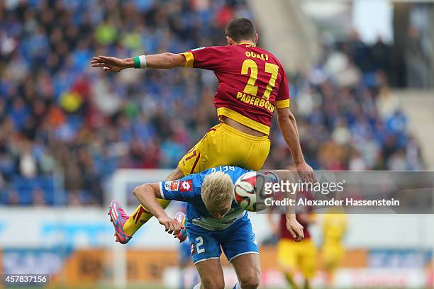 Andreas Beck of Hoffenheim battles for the ball with Idir Ouali of Paderborn during the Bundesliga match between TSV 1899 Hoffenheim and SC Paderborn...