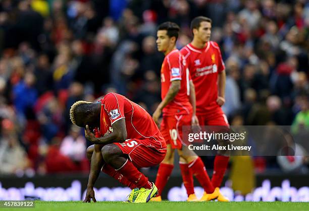 Mario Balotelli of Liverpool shows his frustration after a missed opportunity during the Barclays Premier League match between Liverpool and Hull...