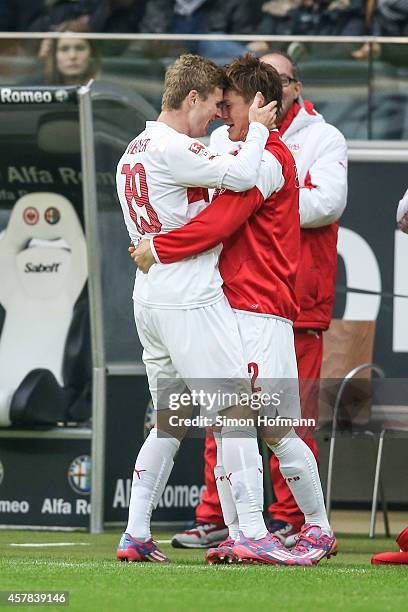 Timo Werner of Stuttgart celebrates his team's fourth goal with his team mate Gotoku Sakai during the Bundesliga match between Eintracht Frankfurt...