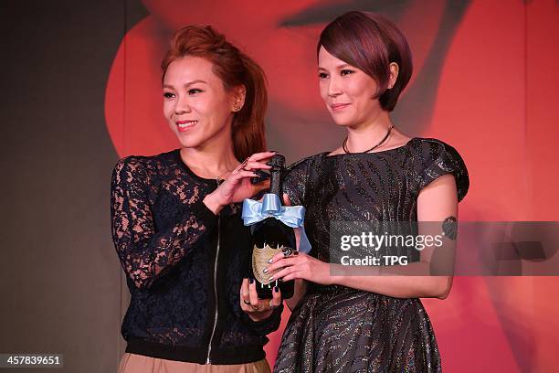 Faith Yang at press conference of her new album on Wednesday December 18,2013 in Taipei,China.Tanya Chua presents to support.