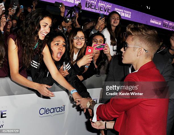 Singer Justin Bieber arrives at the premiere of Open Road Films' "Justin Bieber's Believe" at the Regal Cinemas L.A. Live on December 18, 2013 in Los...