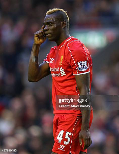 Mario Balotelli of Liverpool reacts after having a penalty appeal turned down during the Barclays Premier League match between Liverpool and Hull...