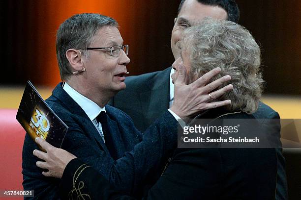 Presenters Guenther Jauch and Thomas Gottschalk try to kiss each other during the taping of the anniversary show '30 Jahre RTL - Die grosse...