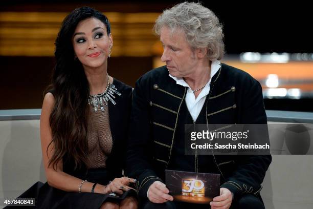 Presenter Thomas Gottschalk looks to Verona Poth's cleavage during the taping of the anniversary show '30 Jahre RTL - Die grosse Jubilaeumsshow mit...