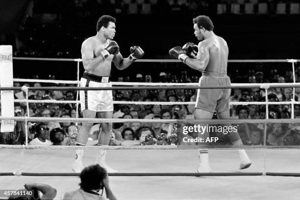 In this photo taken on October 30, 1974 shows the fight between US boxing heavyweight champions, Muhammad Ali and George Foreman in Kinshasa. On...