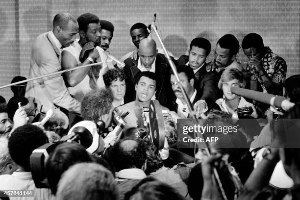 In this photo taken on October 30, 1974 shows US boxing heavyweight champion Muhammad Ali during a press conference after the heavyweight world...