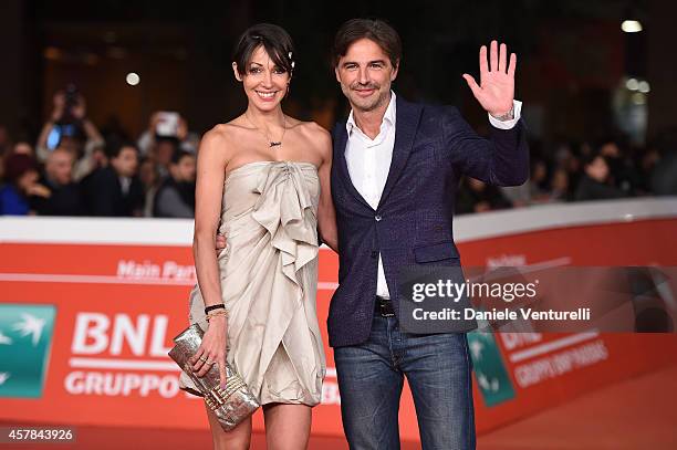 Jennipher Rodriguez and Beppe Convertini attend the awards ceremony red carpet during the 9th Rome Film Festival at Auditorium Parco Della Musica on...