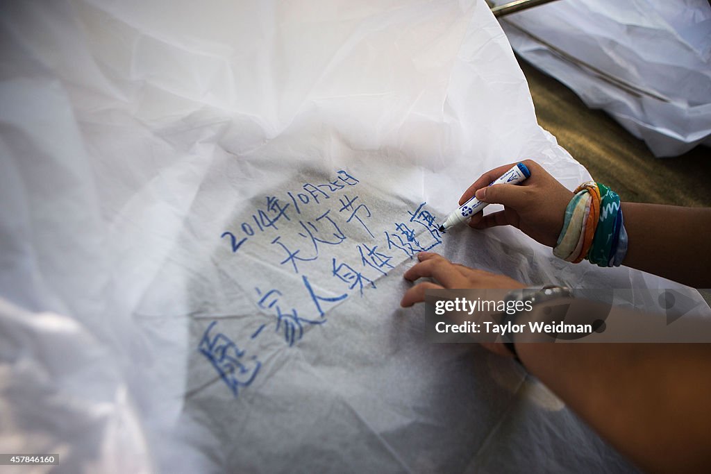 Buddhists Gather For The Floating Lanterns Ceremony