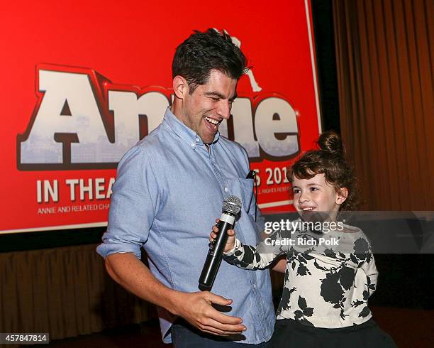 Max Greenfield and daughter Lilly Greenfield host a screening of ANNIE for friends and family at Pacific Theaters at the Grove on October 25, 2014 in...