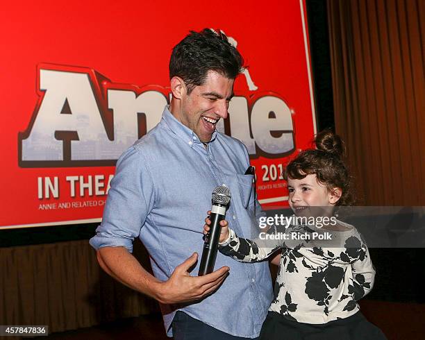 Max Greenfield and daughter Lilly Greenfield host a screening of ANNIE for friends and family at Pacific Theaters at the Grove on October 25, 2014 in...