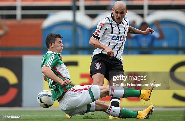 Nathan of Palmeiras fights for the ball with Fabio Santos of Corinthians during the match between Palmeiras and Corinthians for the Brazilian Series...