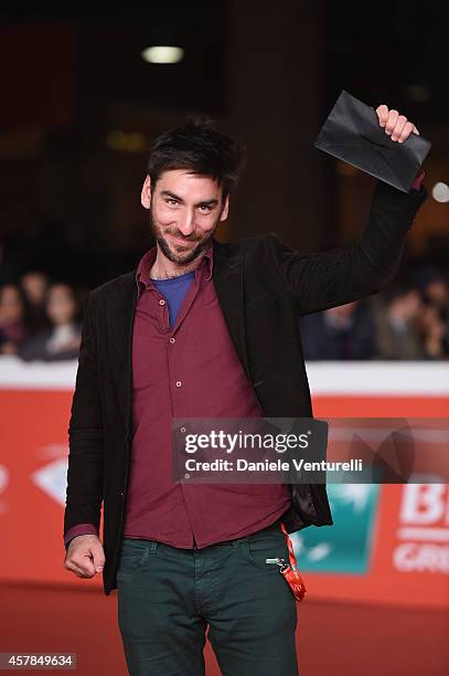 Bartolomeo Pampaloni poses with DOC/IT Award to the Best Italian Documentary at the Award Winners Photocall during the 9th Rome Film Festival at...