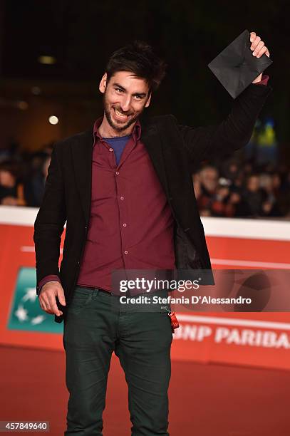 Bartolomeo Pampaloni poses with DOC/IT Award to the Best Italian Documentary at the Award Winners Photocall during the 9th Rome Film Festival at...