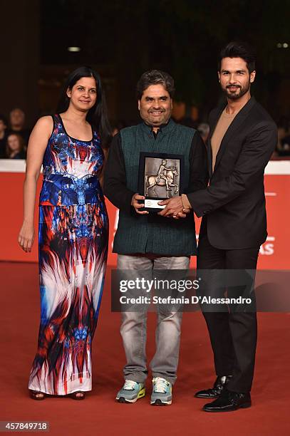 Vishal Bhardwaj, Amrita Pandey and Shahid Kapoor pose with the Peoples Choice Award Mondo Genere at the Award Winners Photocall during the 9th Rome...