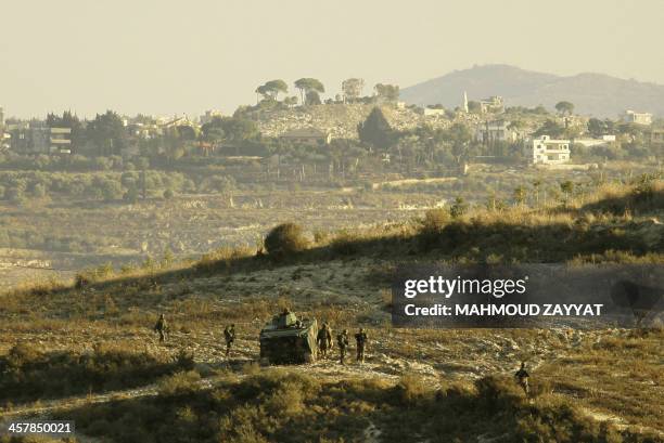 Lebanese army troops search the country side around the southern Lebanese port city of Sidon on December 19, 2013 for radical Islamists suspected of...