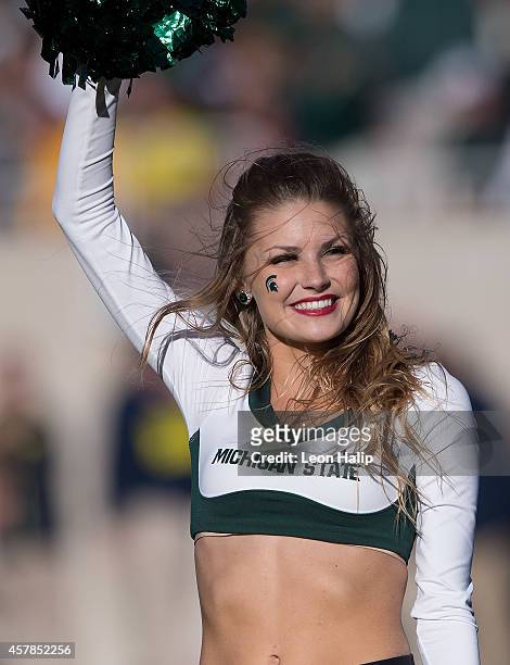 Members of the Michigan State Spartans at Spartan dance team entertain the fans during the second quarter of the game against the Michigan Wolverines...