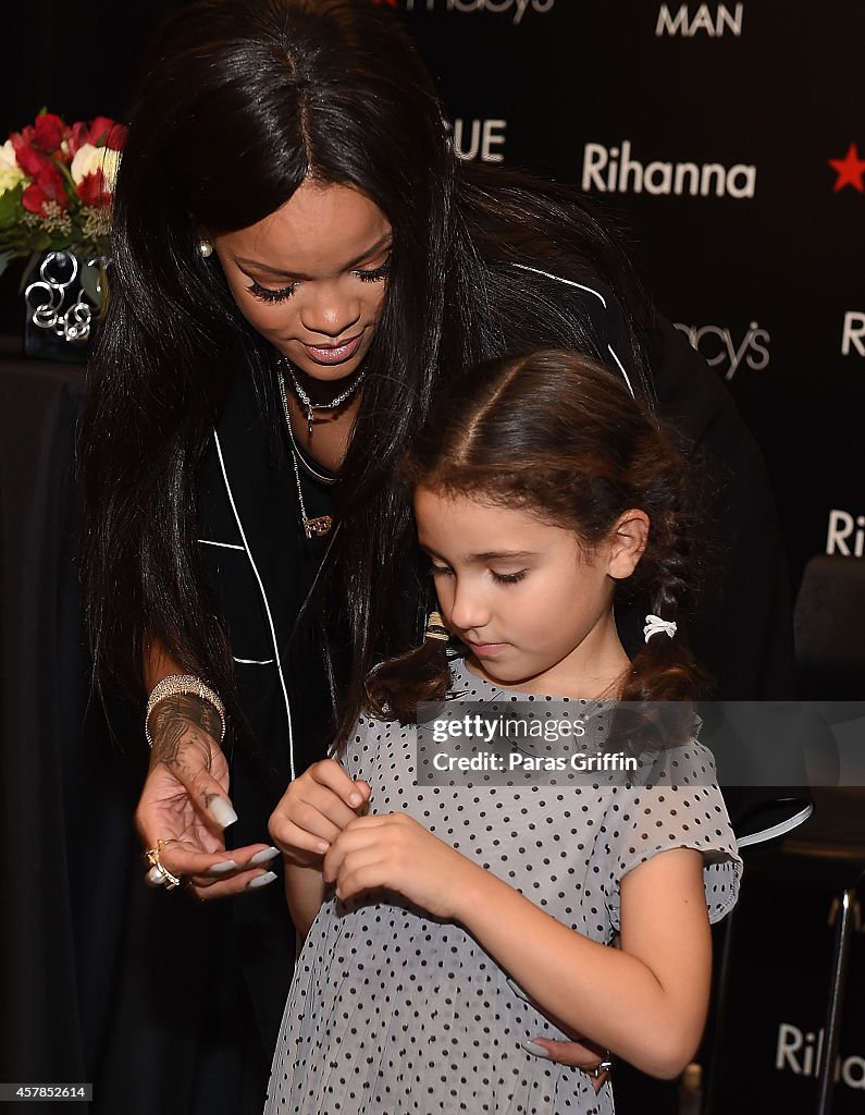 Rihanna Meets With Fans At ROGUE MAN Fragrance Launch