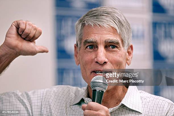 Senator Mark Udall speaks to volunteers at a canvass kickoff campaigns on October 25, 2014 in Thornton, Colorado. Udall is seeking reelection as one...