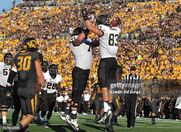 Nathan Marcus of the Vanderbilt Commodores celebrates his touchdown with Spencer Pulley in the second quarter during a game against the Missouri...