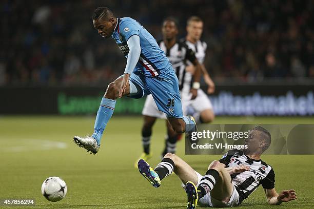 , Charlton Vicento of Willem II, Mike te Wierik of Heracles Almelo during the Dutch Eredivisie match between Heracles Almelo and Willem II at Polman...