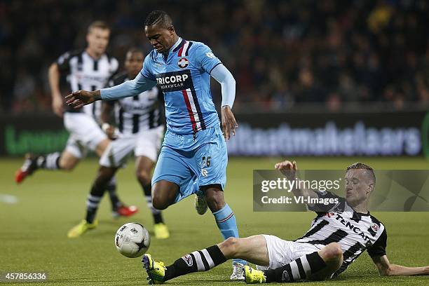 , Charlton Vicento of Willem II, Mike te Wierik of Heracles Almelo during the Dutch Eredivisie match between Heracles Almelo and Willem II at Polman...