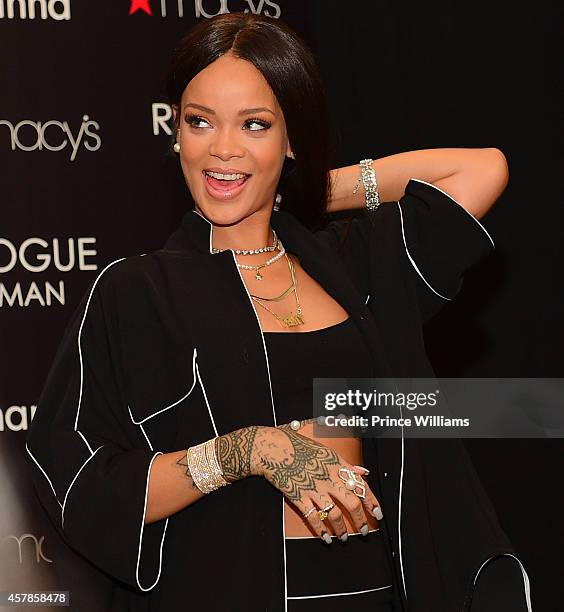 Rihanna attends the Rogue Man By Rihanna Fragrance Launch at Macy's Lenox Square on October 25, 2014 in Atlanta, Georgia.