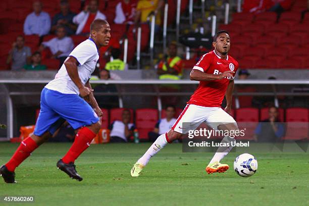 Jorge Henrique of Internacional battles for the ball against Uelliton of Bahia during match between Internacional and Bahia as part of Brasileirao...