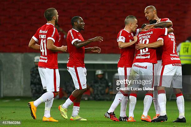 Players of Internacional celebrate their second goal during match between Internacional and Bahia as part of Brasileirao Series A 2014, at Estadio...