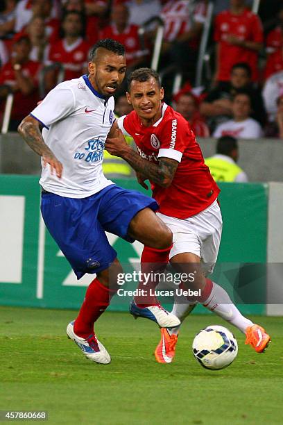 Alan Patrick of Internacional battles for the ball against Demerson of Bahia during match between Internacional and Bahia as part of Brasileirao...