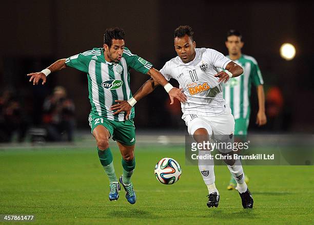 Adil Karrouchy of Raja Casablanca in action with Fernandinho of Atletico Mineiro during the FIFA Club World Cup Semi Final match between Raja...