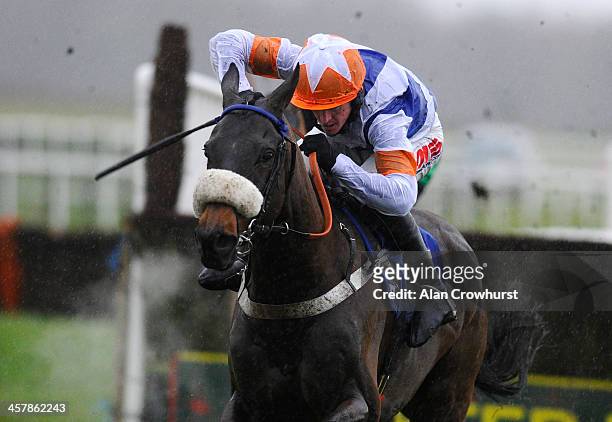 Jason Maguire riding Desert Cry on their way to winning The Free Racing Tips Graduation Steeple Chase at Exeter racecourse on December 19, 2013 in...