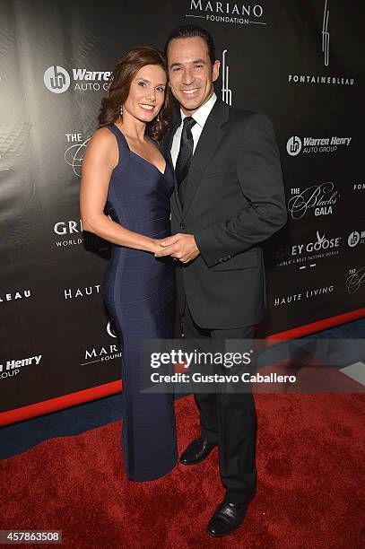 Helio Castroneves and Adriana Henao attend Blacks' Annual Gala at Fontainebleau Miami Beach on October 25, 2014 in Miami Beach, Florida.