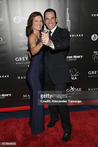 Helio Castroneves and Adriana Henao attend Blacks' Annual Gala at Fontainebleau Miami Beach on October 25, 2014 in Miami Beach, Florida.