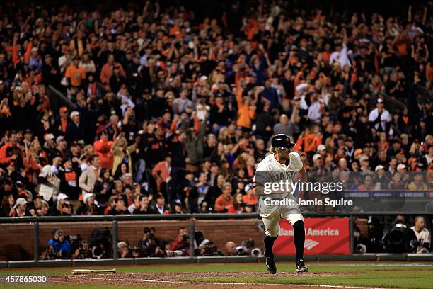 Hunter Pence of the San Francisco Giants hits a RBI single in the fifth inning against the Kansas City Royals during Game Four of the 2014 World...