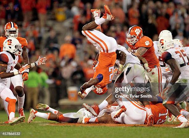 Howard of the Clemson Tigers flips over a defender during the game against the Syracuse Orange at Memorial Stadium on October 25, 2014 in Clemson,...