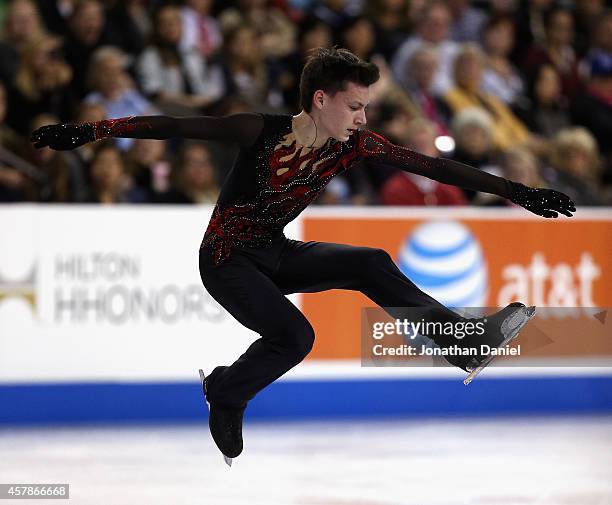 Adian Pitkeev competes during the Men Free Skating during the 2014 Hilton HHonors Skate America competition at the Sears Centre Arena on October 25,...