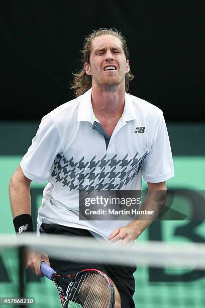 Marcus Daniell of New Zealand in action against Jui-Chen Hung of Chinese Taipaei during day three of the Davis Cup during the Davis Cup tie between...