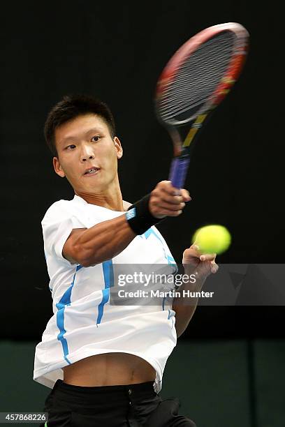 Jui-Chen Hung of Chinese Taipaei in action against Marcus Daniell of New Zealand during day three of the Davis Cup during the Davis Cup tie between...