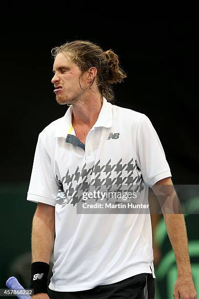 Marcus Daniell of New Zealand in action against Jui-Chen Hung of Chinese Taipaei during day three of the Davis Cup during the Davis Cup tie between...
