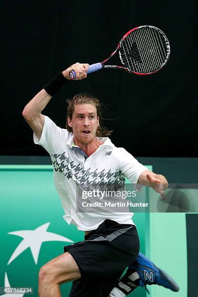 Marcus Daniell of New Zealand in action against Jui-Chen Hung of Chinese Taipaei during day three of the Davis Cup during the Davis Cup tie between...