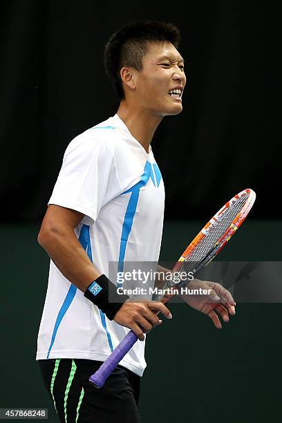 Jui-Chen Hung of Chinese Taipaei in action against Marcus Daniell of New Zealand during day three of the Davis Cup during the Davis Cup tie between...