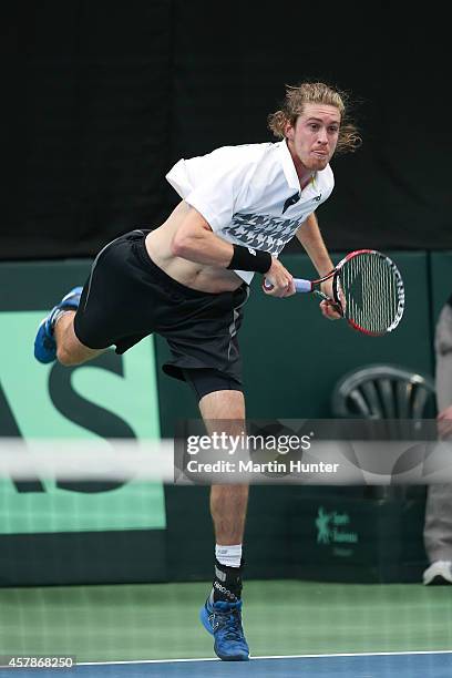 Marcus Daniell of New Zealand in action against Jui-Chen Hung of Chinese Taipaei during day three of the Davis Cup during the Davis Cup tie between...