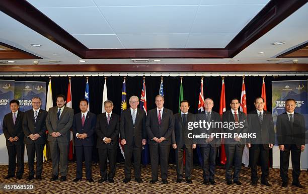 Family photo shows trade ministers from the Trans-Pacific Partnership , a pan-Pacific trade agreement from 12 nations Lim Jock Hoi from Brunei...