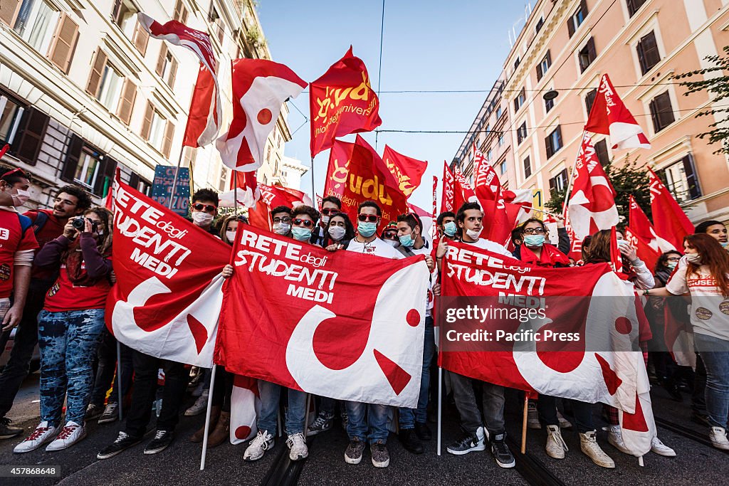 Students take part in a demonstration organised by the...