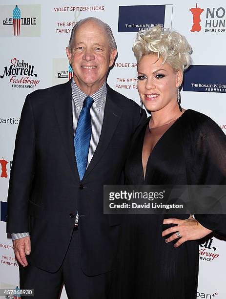 Share Our Strength founder & CEO Billy Shore and singer Pink attend the Share Our Strength's No Kid Hungry Campaign fundraising dinner at Ron...