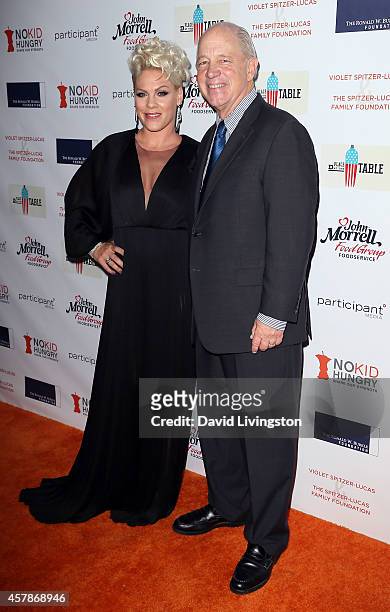Singer Pink and Share Our Strength founder & CEO Billy Shore attend the Share Our Strength's No Kid Hungry Campaign fundraising dinner at Ron...