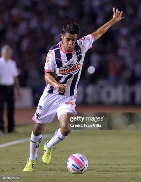 Severo Meza prepares a shot during a match between Monterrey and Tigres UANL as part of 14th round Apertura 2014 Liga MX at Tecnologico Stadium on...