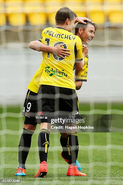 Michael McGlinchey of the Phoenix celebrates his goal with teammate Nathan Burns during the round three A-League match between the Wellington Phoenix...