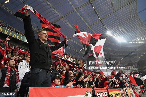 Fans of Leverkusen celebrate during the team presentation during the Bundesliga match between Bayer 04 Leverkusen and FC Schalke 04 at BayArena on...