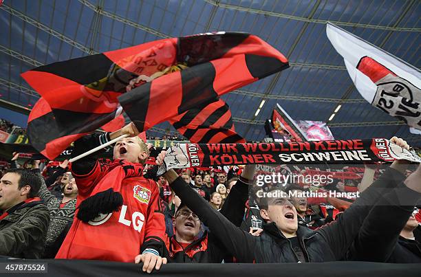 Fans of Leverkusen celebrate during the team presentation during the Bundesliga match between Bayer 04 Leverkusen and FC Schalke 04 at BayArena on...